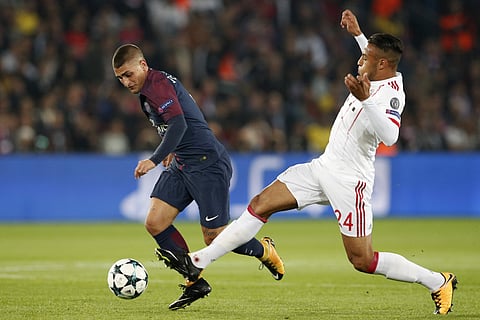 PSG's Marco Verratti, left, and Bayern's Corentin Tolisso vie for the ball during a Champions League Group B soccer match between Paris Saint-Germain and Bayern Munich at the Parc des Princes stadium in Paris. | AP