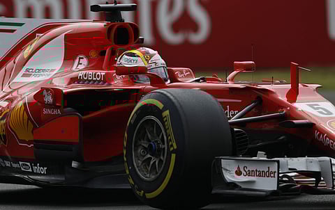 Ferrari driver Sebastian Vettel, of Germany, steers his car during the Formula One Mexico Grand Prix auto race at the Hermanos Rodriguez racetrack in Mexico City, Sunday, Oct. 29, 2017. | AP