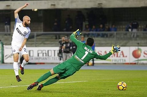 Inter Milan's Borja Valero, left, scores during the Serie A soccer match between Verona and Inter Milan, at the Bentegodi stadium in Verona, Italy. | AP