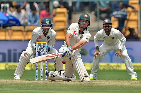 Australia's opening batsman Matt Renshaw plays a sweep shot action against India in the second Test match against India at the M Chinnaswamy Stadium, Bengaluru on March 5, 2017. | Express Photo by Jithendra M.