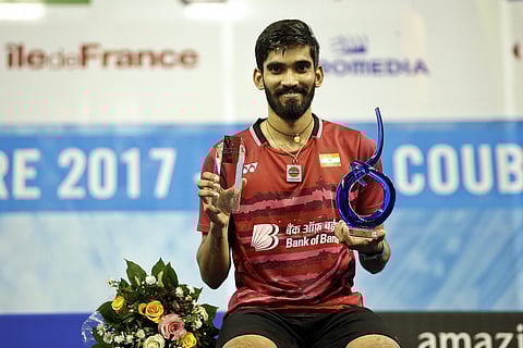 India's Srikanth Kidambi poses for photographers after he won his men's final match of the French Open badminton tournament in Paris.|PTI