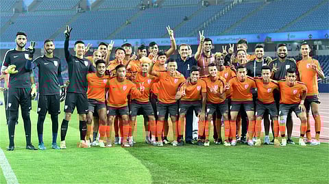 AIFF President Praful Patel poses for photo with the Indian team players before a practice session on the eve of their U-17 World Cup match against USA in New Delhi on Thursday. | PTI