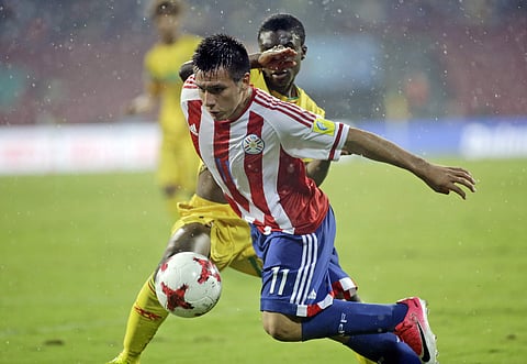 Paraguay's Leonardo Sanchez lunges forward with the ball during the FIFA U-17 World Cup match against Mali