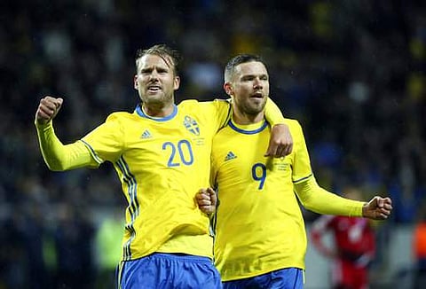 Sweden's Marcus Berg, right, celebrates scoring with teammate Ola Toivonen during the World Cup 2018 group A qualifying match between Sweden and Luxembourg at Friends Arena in Solna. | AP