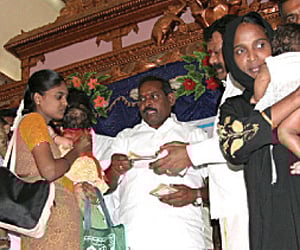 Social Welfare Minister M Kandasamy (centre). (File Photo)