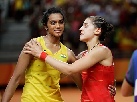 PV Sindhu and Spain’s Carolina Marin. | AP