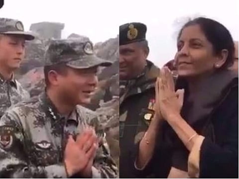 'Do you know what 'Namaste' means,' Sitharaman was seen asking one of the People's Liberation Army personnel who appeared confused. (Photo collage from video posted by @DefenceMinIndia)