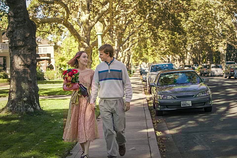 This image released by A24 Films shows Saoirse Ronan, left, and Lucas Hedges in a scene from 'Lady Bird.' | AP