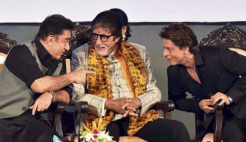 The titans share a tête-à-tête: Tamil actor Kamal Haasan (left), Bollywood superstars Amitabh Bachchan (centre) and Shah Rukh Khan interact at the inauguration of the 23rd edition of the Kolkata International Film Festival. The KIFF, India's second oldest