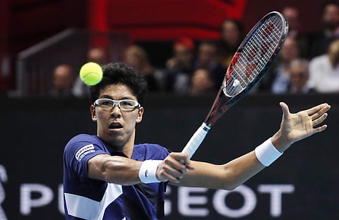 Hyeon Chung, of South Korea, returns the ball to Andrey Rublev, of Russia, during the ATP Next Gen tennis tournament final, in Milan. | AP
