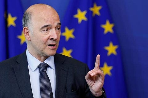 European Economic and Financial Affairs Commissioner Pierre Moscovici holds a news conference at the EU Commission headquarters in Brussels. (Photo | Reuters)