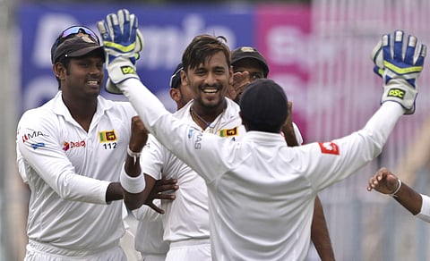 Sri Lanka's Suranga Lakmal (C) celebrates with teammates the dismissal of India's Lokesh Rahul | AP