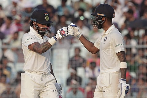 India's Shikhar Dhawan and K. L. Rahul cheer each other during their partnership during fourth day of the Test match | AP