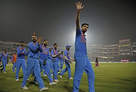 India's Ashish Nehra waves to the crowd as he bids farewell at the end of his last international match | AP