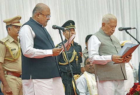 H M Revanna being administered the oath of office by Governor Vajubhai Vala in Bengaluru on Friday | Express