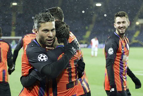 Shakhtar's Marlos, left, celebrates victory with his teammates after a match against Feyenoord during a Champions League Group F soccer match between Feyenoord and Shakhtar Donetsk at the Metalist Stadium in Kharkiv, Ukraine, Wednesday, Nov. 1, 2017. | AP