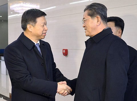 Song Tao, the head of China's ruling Communist Party's International Liaison Department, is greeted by Ri Chang Gun, vice department director of the Central Committee of North Korea's ruling party.