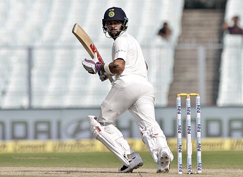 India's captain Virat Kohli watches his shot during the fifth day of their first test cricket match against Sri Lanka in Kolkata. | AP
