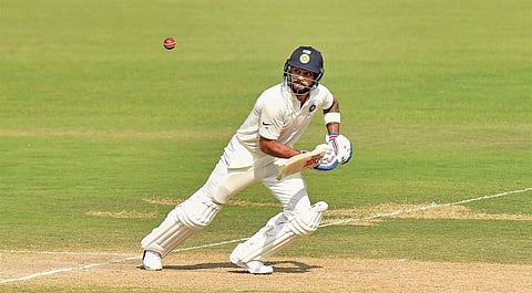 Indian skipper Virat Kohli in action during the final day of the first Test match against Sri Lanka at Eden Gardens in Kolkata on Monday. | PTI