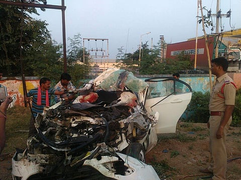 The mangled remains of the vehicle which rammed into a roadside lorry in Karimnagar. (Photo | Satish Babu)