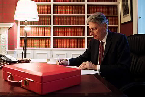 Britain's Finance Minister Philip Hammond prepares his 2017 budget speech in his office in Downing Street, London, November 21, 2017. (Reuters File Photo)