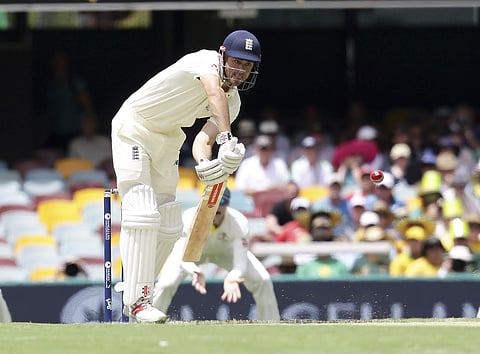 England's Alastair Cook plays a shot during the Ashes cricket test match against Australia in Brisbane. | AP