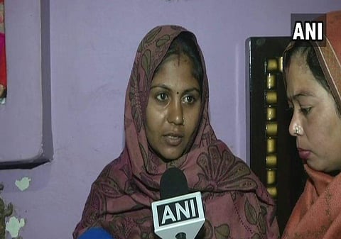 Bus conductor Ashok's wife speaks with the media. (ANI)