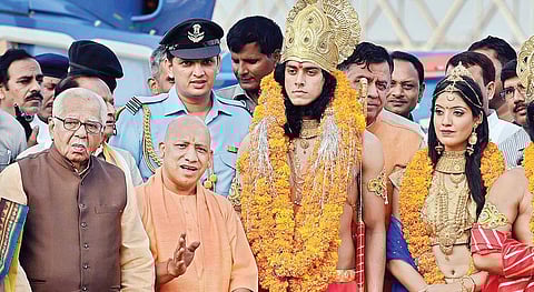 UP Governor Ram Naik and Chief Minister Yogi Adityanath with artistes dressed up as Lord Ram and Sita in Ayodhya during Diwali | PTI