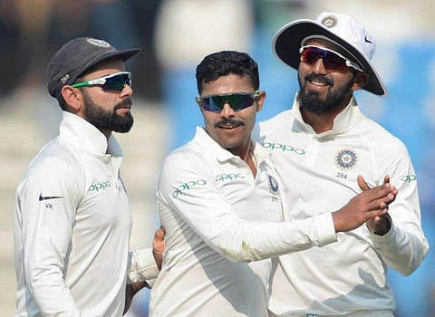 Indian bowler Ravindra Jadeja centre celebrate the wicket of Sri Lankan batsman Niroshan Dickwella with skipper Virat Kohli left and KL Rahul right during the second Test match in Nagpur on Friday. | PTI