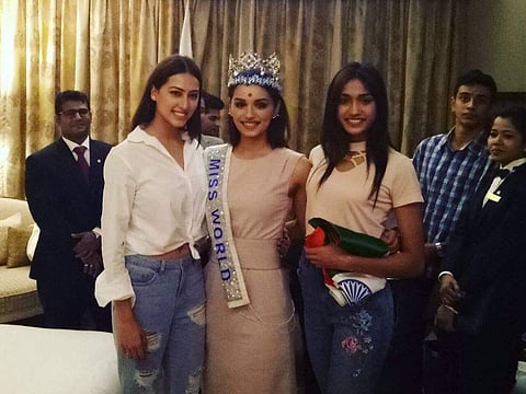 Manushi Chhillar in a photo with Miss India 2017 runners up Priyanka Kumari (L) and Sana Dua (R) after the Miss World's arrival in Mumbai on November 26. (Twitter Photo | @feminamissindia)