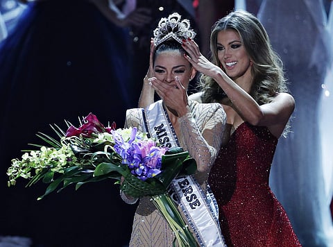 South Africa's Demi-Leigh Nel-Peters walked away with the crown, ending a nearly four-decade long jinx for her country in one of the world's biggest pageants. IN PIC: Former Miss Universe Iris Mittenaere, right, crowns new Miss Universe Demi-Leigh Nel-Pet