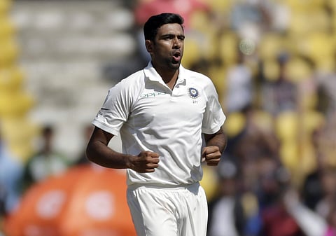 India's Ravichandran Ashwin celebrates the dismissal of Sri Lanka's Dilruwan Perera during the fourth day of their second Test match in Nagpur, India, Monday, Nov. 27, 2017. | AP