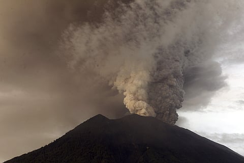 Clouds of ashes rise from the Mount Agung volcano erupting in Karangasem, Indonesia, Monday, Nov. 27, 2017.| AP Photo