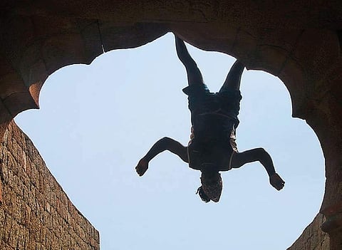 Meet Jyothi Raj: Karnataka's Monkey Man who can climb walls and hang upside down on them