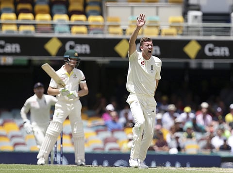 England's Jake Ball (right) appeals for the wicket of Australia's Cameron Bancroft (left) during their Ashes Test match in Brisbane, Australia, Monday, Nov. 27, 2017. | AP