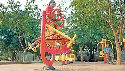 60-year-old Sharadamma, a housewife, works out at an open gym in Sanjaynagar. Her cross-training routine inspires many others, including youngsters, to follow suit  Vinod Kumar T