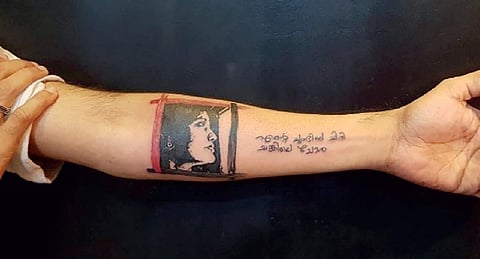 The tattoo engraved on Bijibal's hand