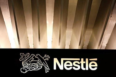 The Nestle logo is pictured on the company headquarters entrance building in Vevey, Switzerland February 18, 2016. (REUTERS)