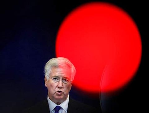 In this file photo dated Thursday, June 15, 2017, Britain's defense minister Michael Fallon speaks at the Romanian defense ministry in Bucharest, Romania. | AP