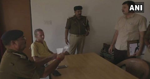 The German national  with the UP police. (ANI)