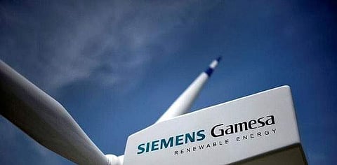 A model of a wind turbine with the Siemens Gamesa logo is displayed outside the annual general shareholders meeting in Zamudio, Spain, June 20, 2017. (Photo / Reuters)