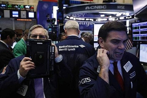 Traders work on the floor of the New York Stock Exchange (NYSE) shortly after the opening bell in New York, NY, U.S. December 13, 2016. (Reuters)