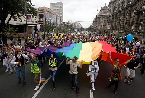 Intersex people would have features that are neither wholly female nor wholly male, or a combination or neither.