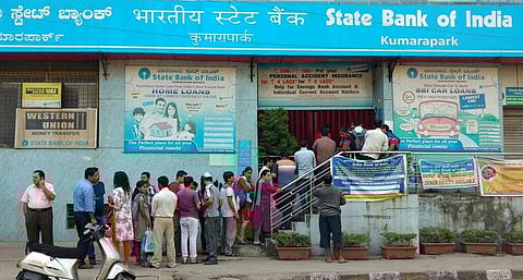 People waiting outside a bank to exchange old currency notes after PM Modi announced the Demonetisation on November 8. (File | EPS)