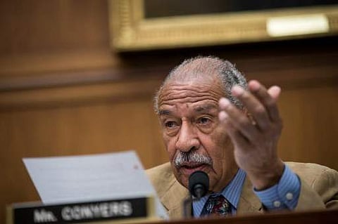 Democratic lawmaker John Conyers, facing mounting pressure to resign over allegations of sexual harassment and an alleged payoff to cover up his actions, has been hospitalized for stress. | AFP