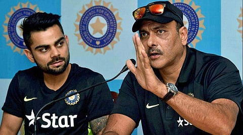 Indian skipper Virat Kohli (L) and coach Ravi Shastri (File | PTI)
