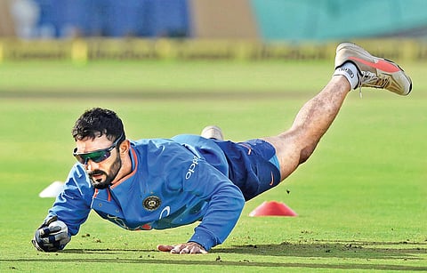 Dinesh Karthik during fielding practice on the eve of the first One-day International against Sri Lanka at the HPCA Stadium in Dharamsala, on Saturday | PTI