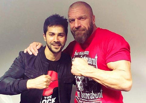 Actor Varun Dhawan and WWE star Triple H (Photo | Varun Dhawan Instagram)