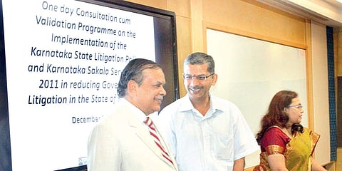 Justice N Kumar (left) and others are seen during a day-long consultation -cum-validation programme on the implementation of the Karnataka State Litigation Policy and Karnataka Sakala Services Act 2011 in reducing government litigation held at NLSIU campu
