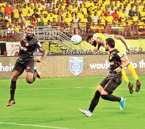 CK Vineeth heads in Kerala Blasters’ winner against NorthEast United FC at JN Stadium in Kochi on Friday (EPS | Melton Antony)